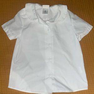 Uniform. Peter Pan collar. White. Size six. Short sleeve button up.